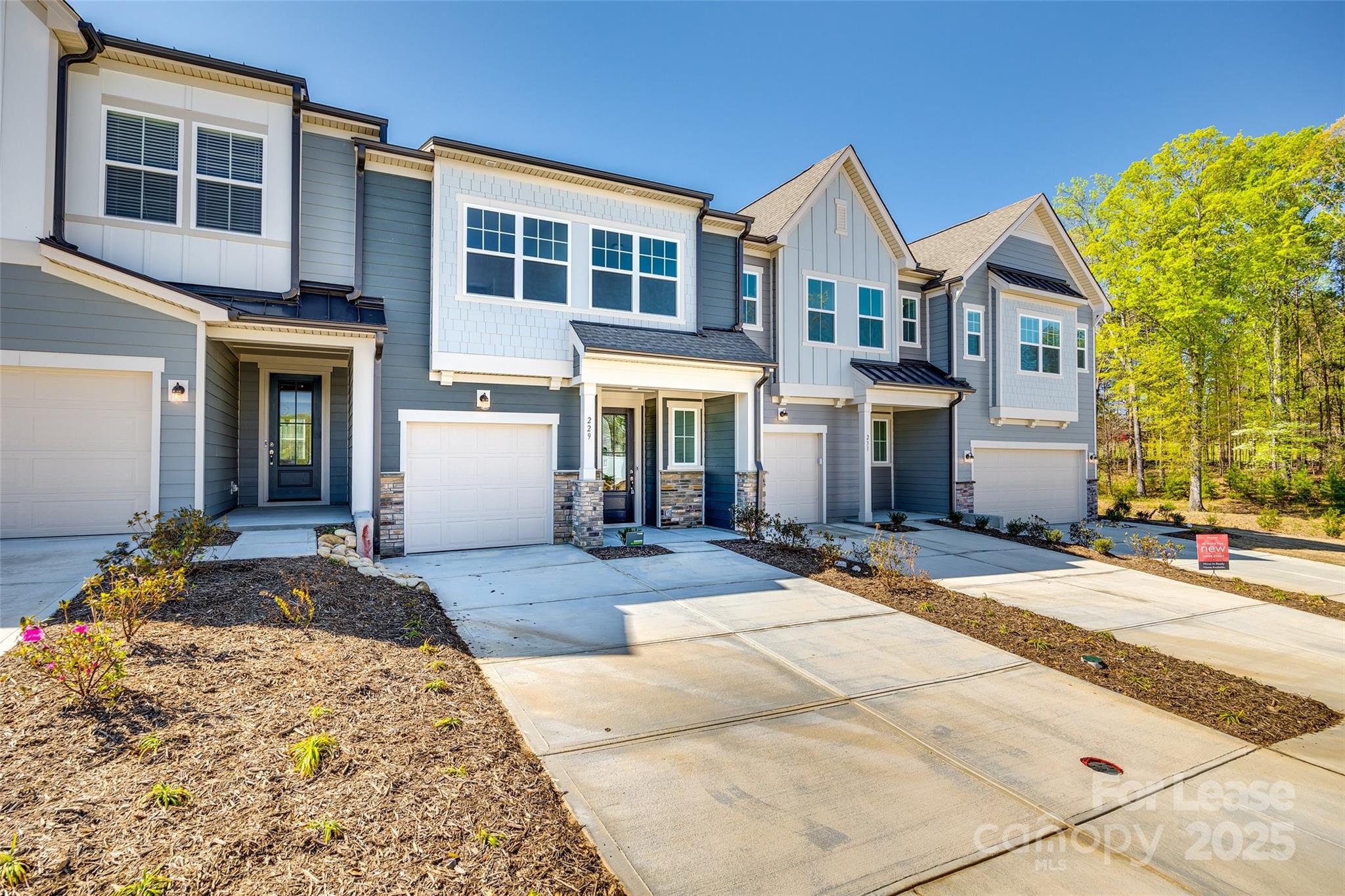 229 Brooks Springs Drive, Unit 34 Fort Mill, SC 29708 - Photo 31 of 31 a front view of a house with yard