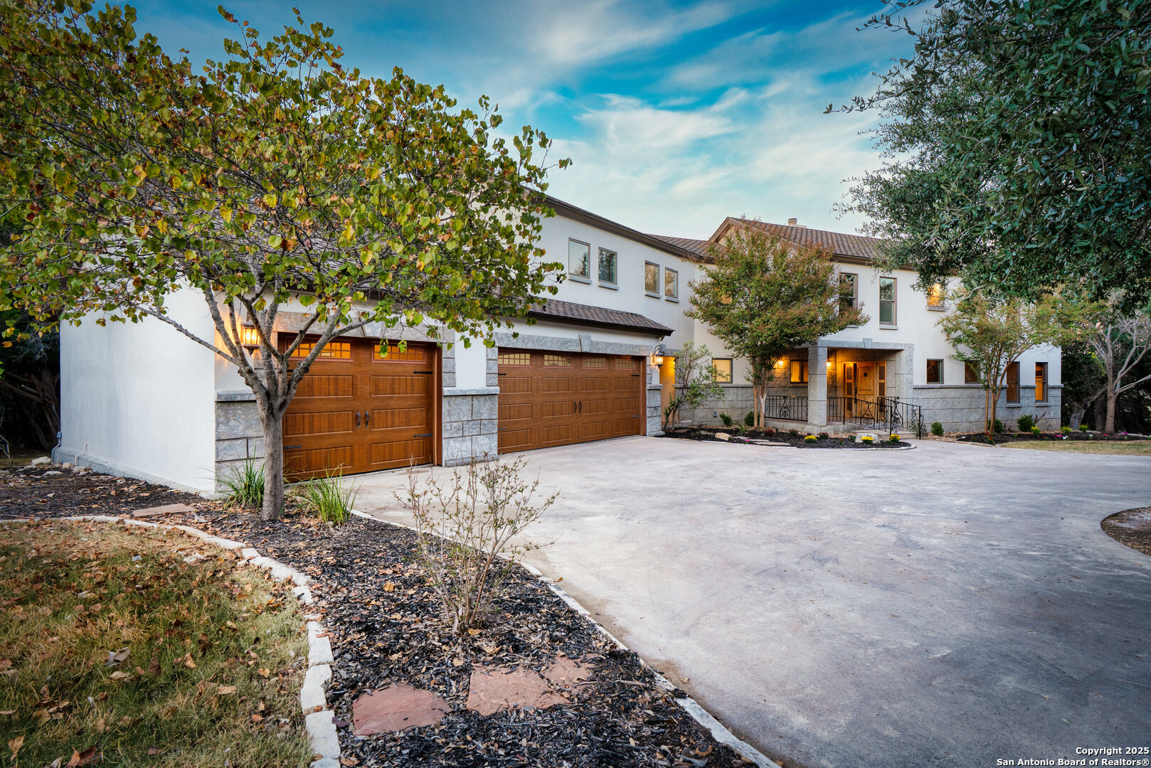 101 Ranch View Boerne, TX 78006 - Photo 14 of 63 a front view of a house with a yard and garage