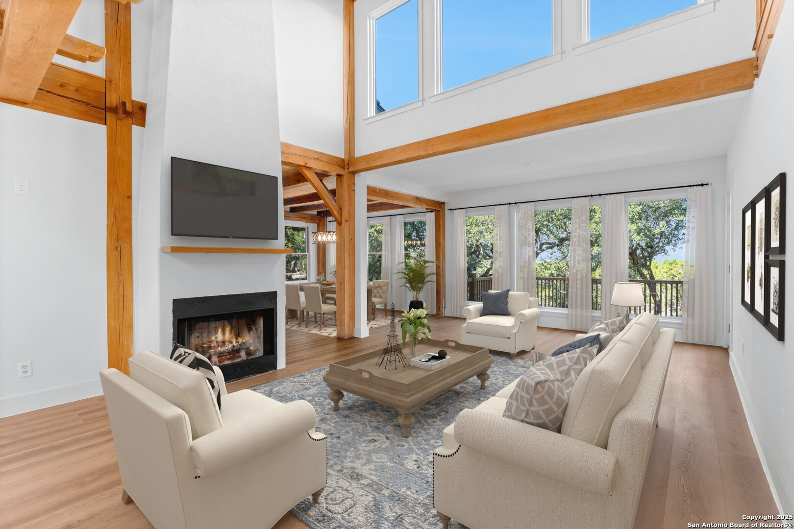 101 Ranch View Boerne, TX 78006 - Photo 20 of 63 a living room with furniture fireplace and a large window