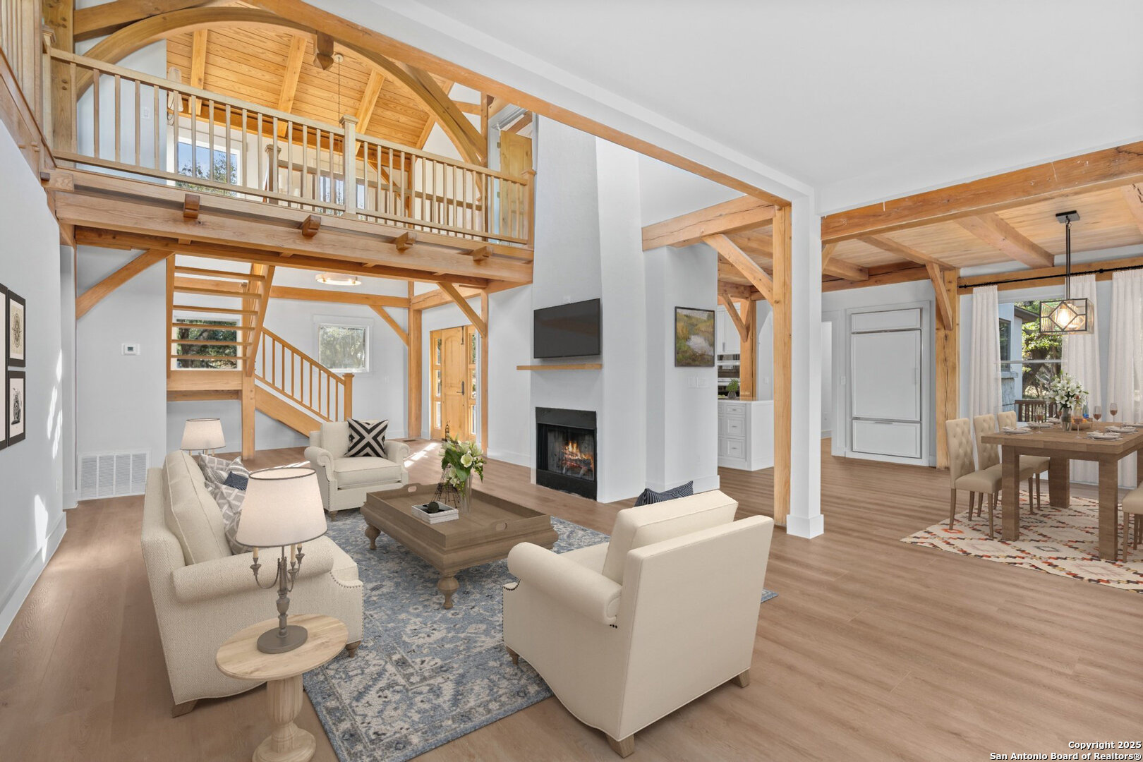 101 Ranch View Boerne, TX 78006 - Photo 22 of 63 a living room with fireplace furniture and a wooden floor