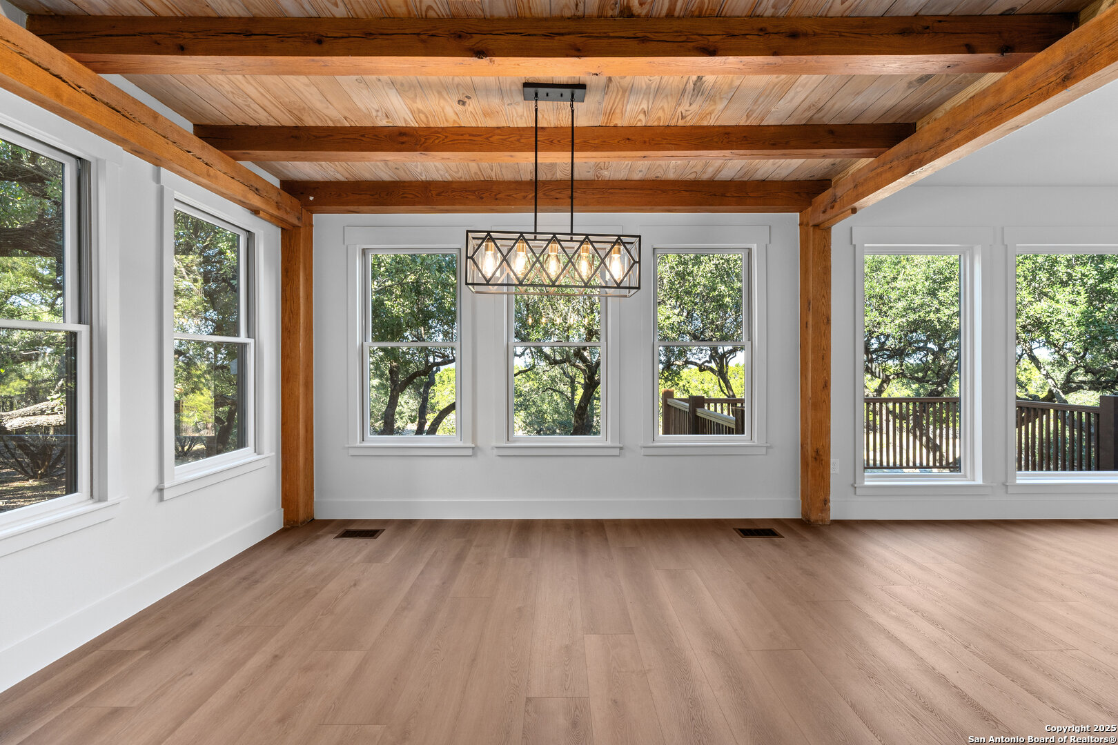 101 Ranch View Boerne, TX 78006 - Photo 26 of 63 a view of an empty room with wooden floor and a window