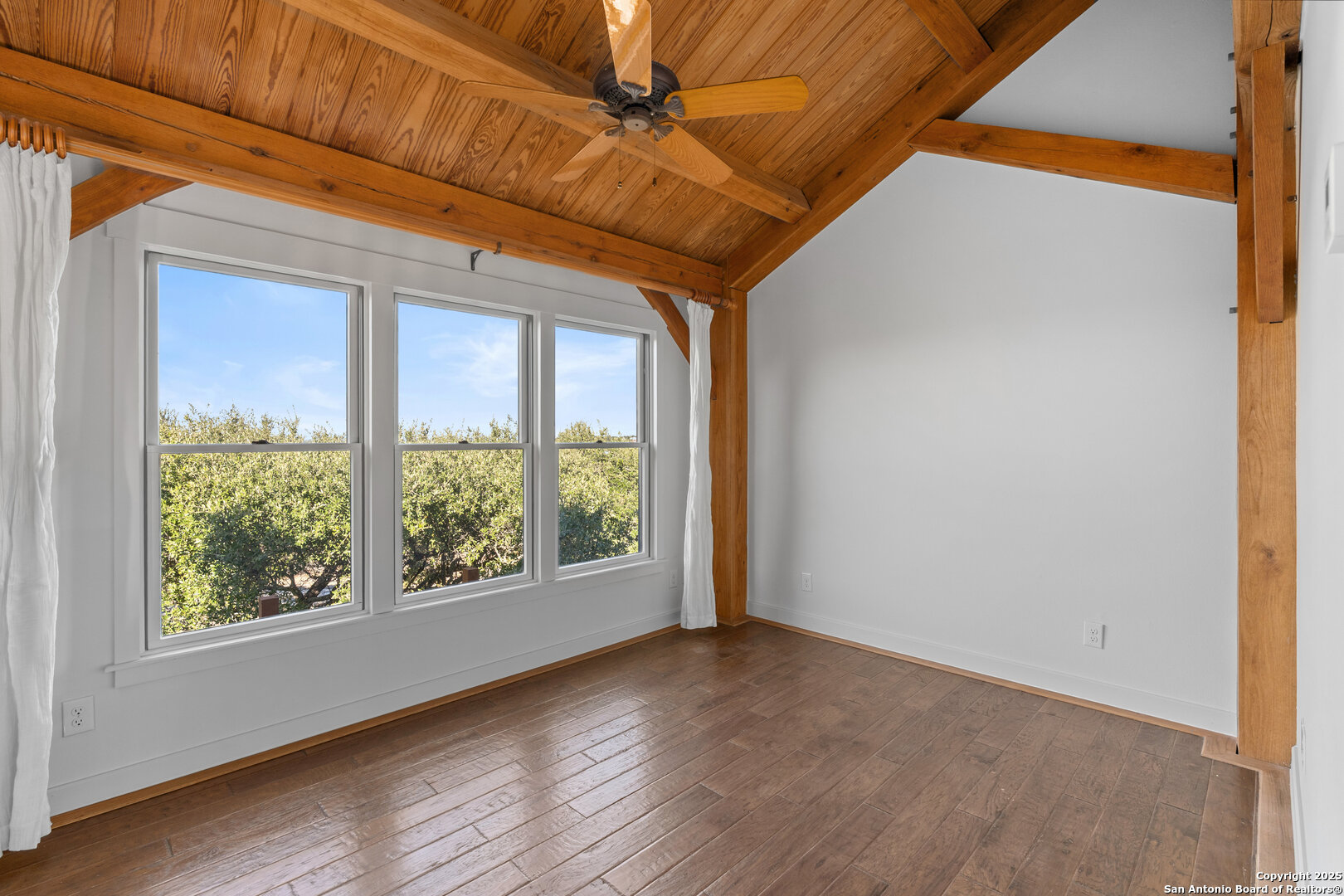 101 Ranch View Boerne, TX 78006 - Photo 44 of 63 a view of room with window and wooden floor