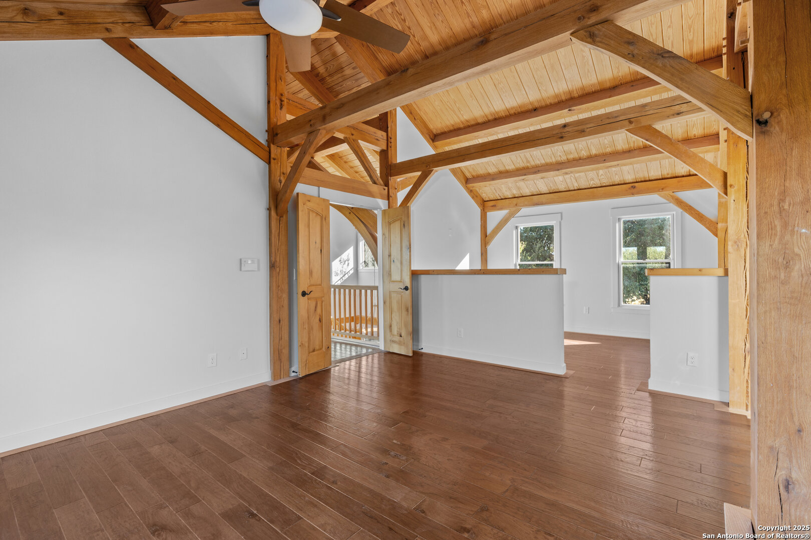 101 Ranch View Boerne, TX 78006 - Photo 53 of 63 a view of an empty room with wooden floor and a window