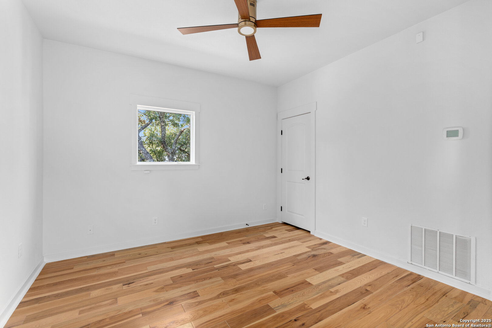 101 Ranch View Boerne, TX 78006 - Photo 58 of 63 a view of empty room with wooden floor