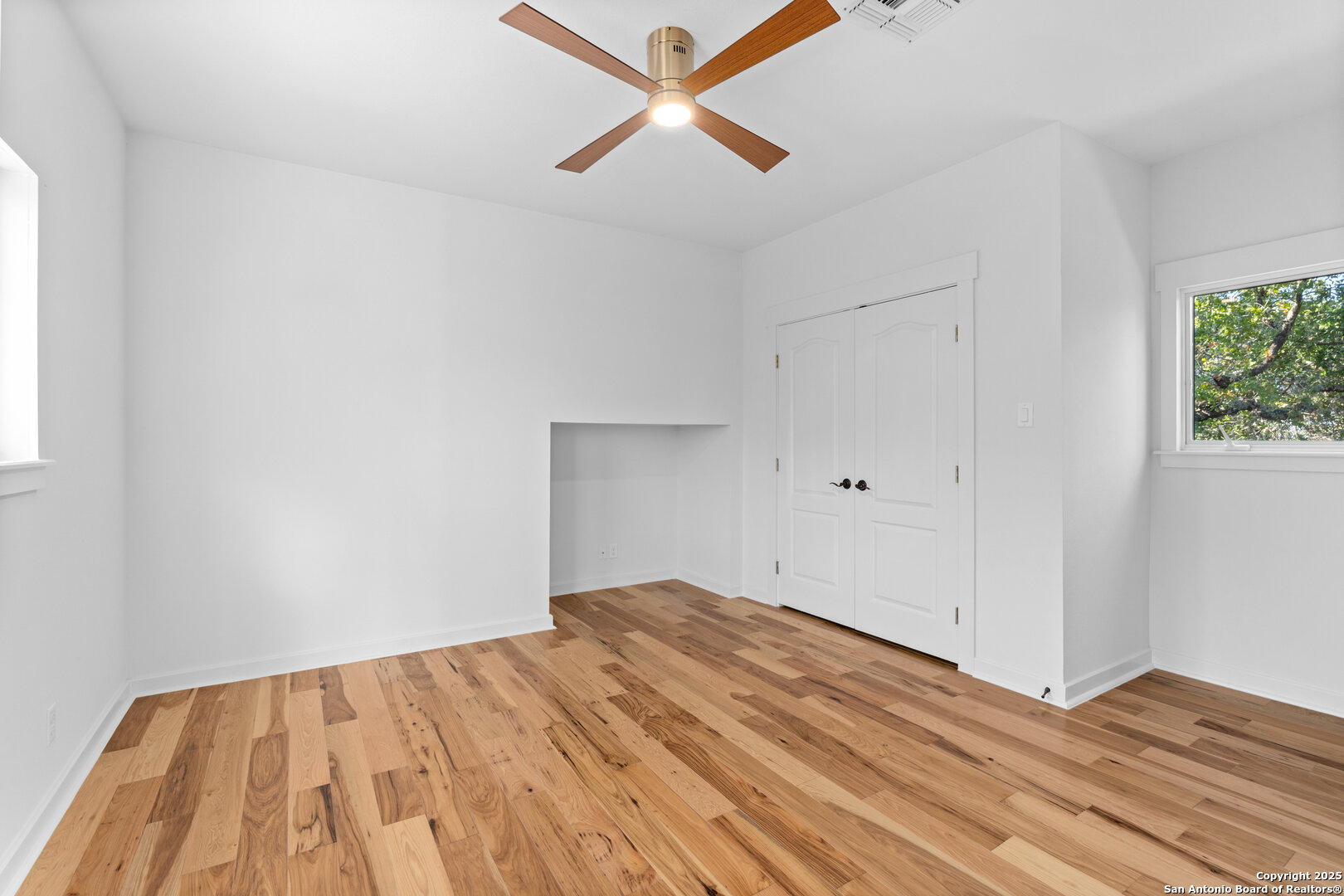 101 Ranch View Boerne, TX 78006 - Photo 59 of 63 a view of empty room with wooden floor and fan
