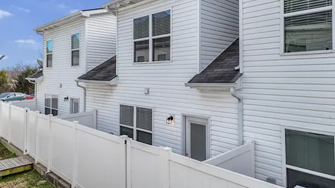 a view of a house with wooden stairs