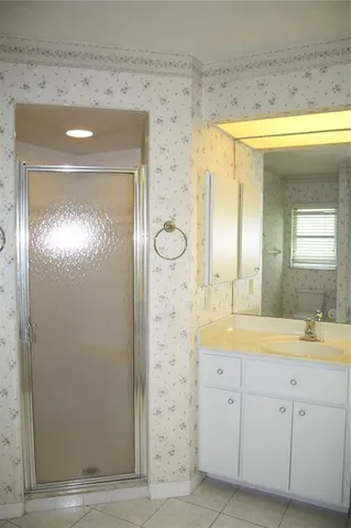 a spacious bathroom with a shower