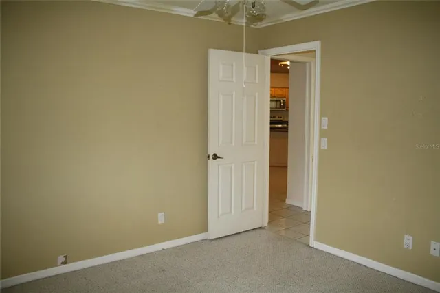 an empty room with a bathroom