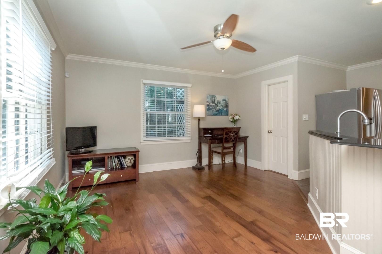 116 Florence Place Mobile, AL 36607 - Photo 18 of 41 Interior space featuring ceiling fan, hardwood / wood-style floors, and crown molding