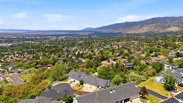3766 Cardiff Circle Bountiful, UT 84010 - Photo 37 of 46 Expansive aerial perspective showcasing a residential area with varied rooflines and established landscaping