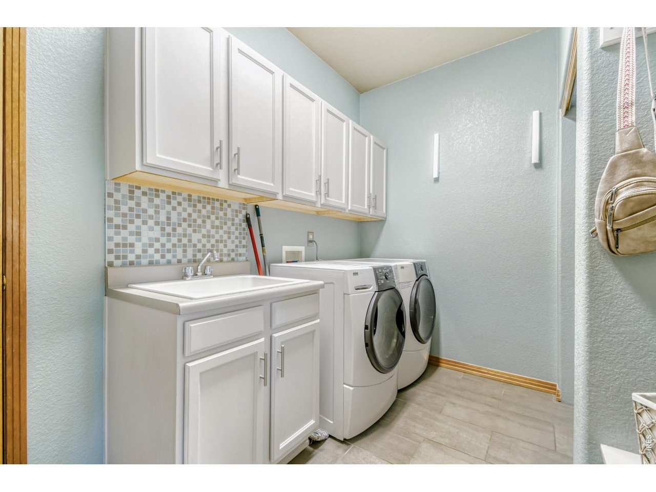 6350 Wier Way Arvada, CO 80403 - Photo 11 of 38 a utility room with dryer and washer