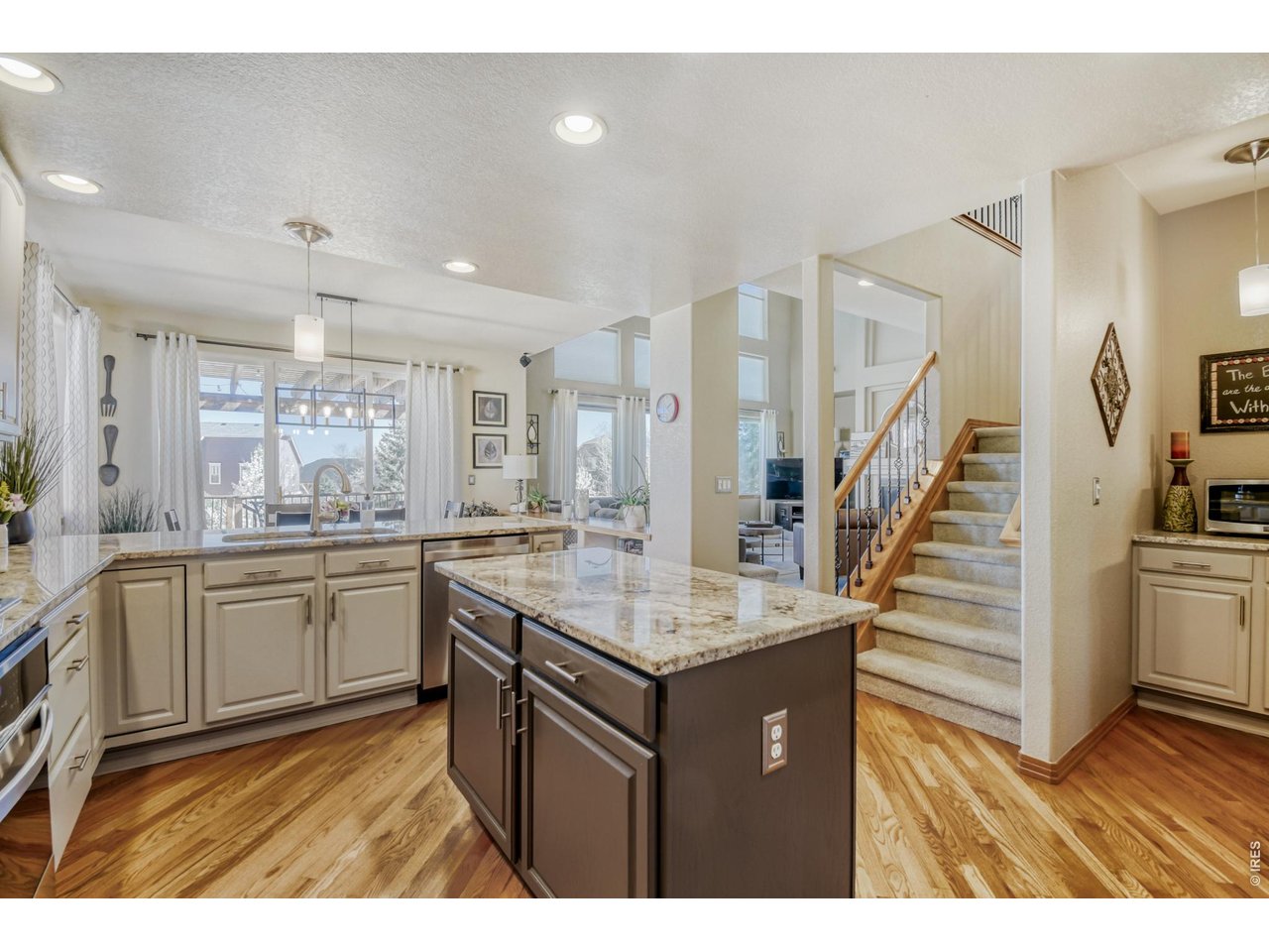 6350 Wier Way Arvada, CO 80403 - Photo 14 of 38 a kitchen with sink and cabinets