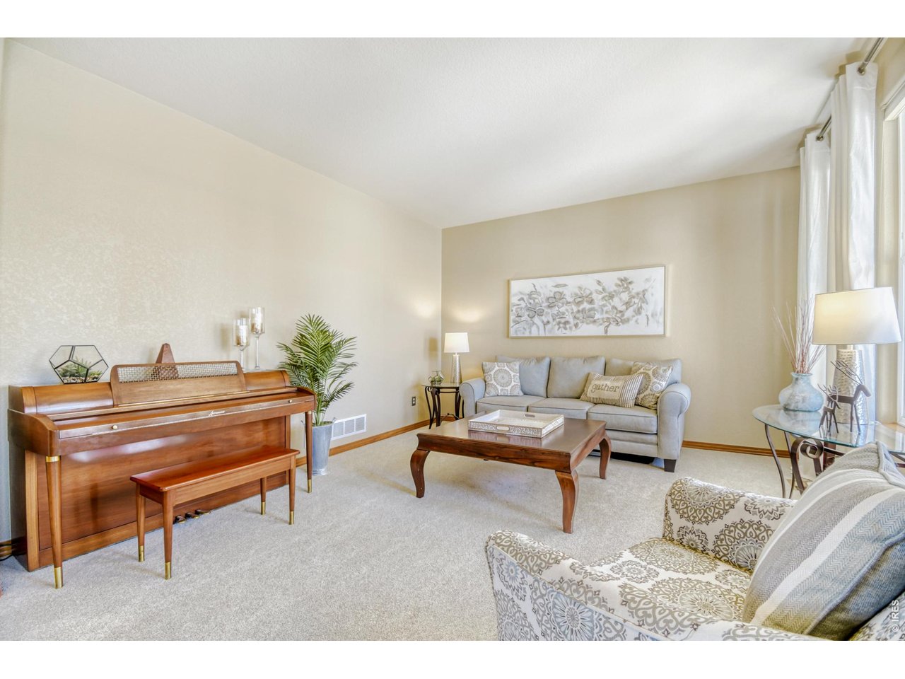 6350 Wier Way Arvada, CO 80403 - Photo 18 of 38 a living room with furniture and a piano