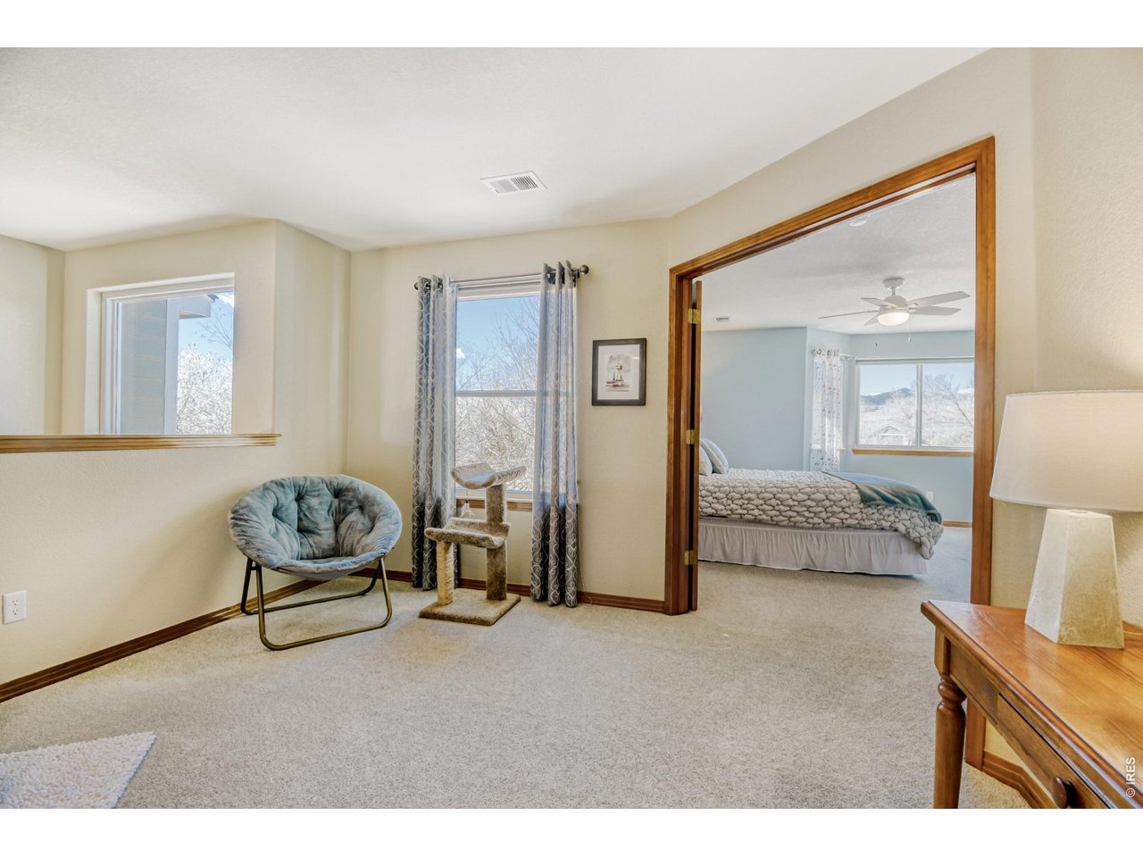 6350 Wier Way Arvada, CO 80403 - Photo 25 of 38 a bedroom with furniture and a window