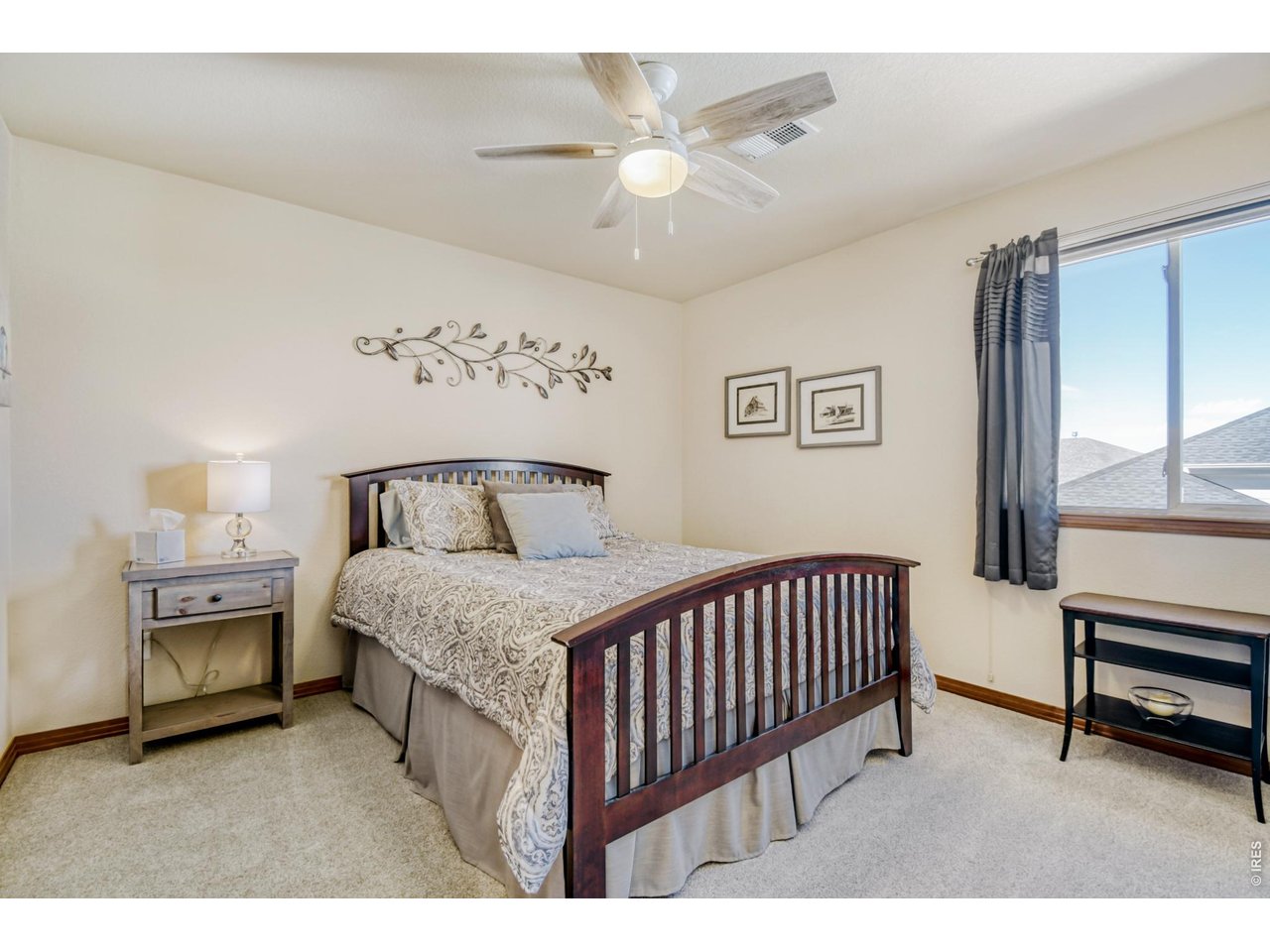 6350 Wier Way Arvada, CO 80403 - Photo 28 of 38 a bedroom with a bed and a view of bedroom