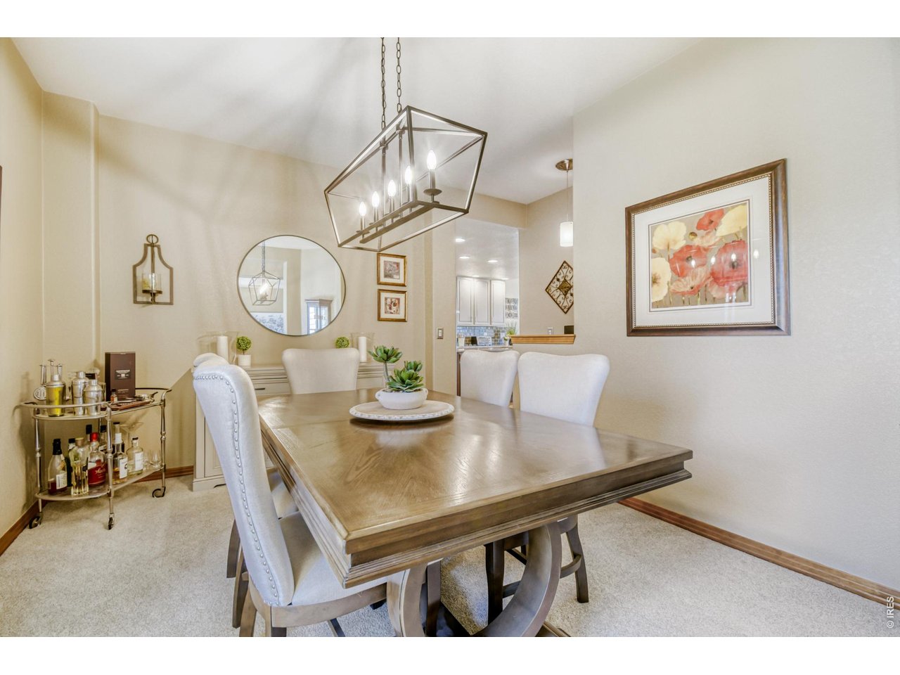 6350 Wier Way Arvada, CO 80403 - Photo 8 of 38 a view of a dining room with furniture and wooden floor