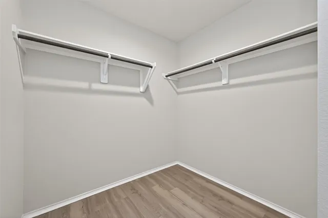 a view of an empty walk in closet