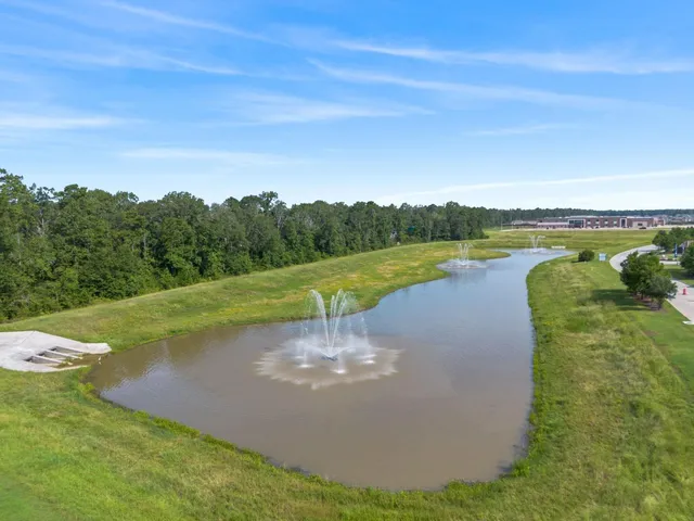 a view of a lake with a city view