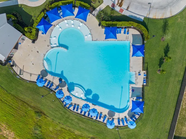 an aerial view of a swimming pool