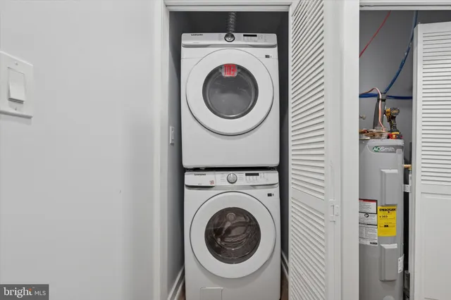 a utility room with dryer and washer