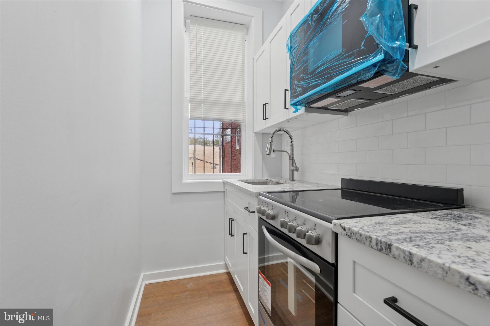 251 South 44th Street, Unit 2 Philadelphia, PA 19104 - Photo 10 of 12 a utility room with dryer and washer
