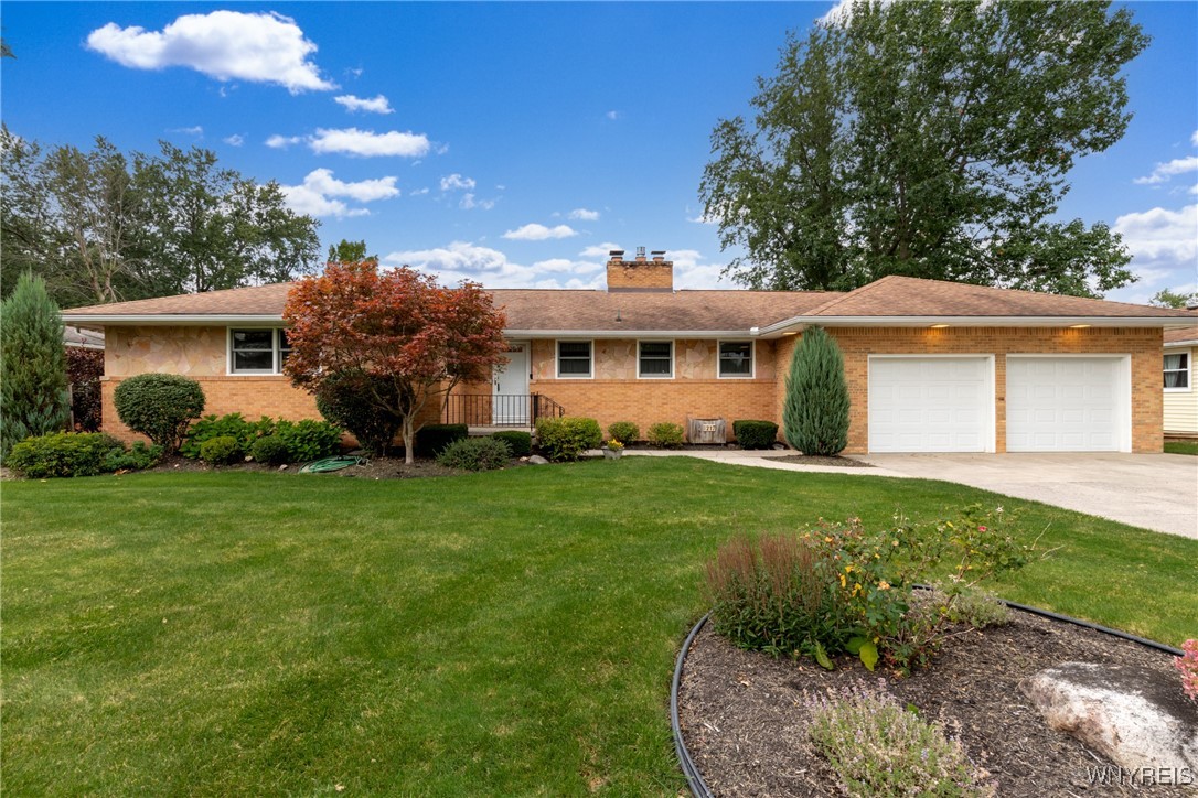 217 West Maplemere Road Amherst, NY 14221 - Photo 1 of 1 Professionally Landscaped Front Yard.