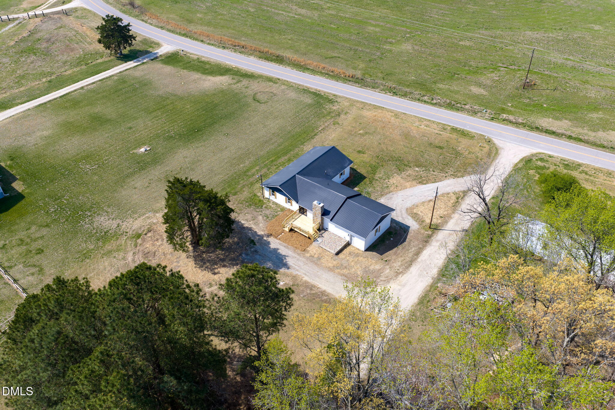 426 Rooker Dairy Road Norlina, NC 27563 - Photo 4 of 33 an aerial view of residential houses with outdoor space