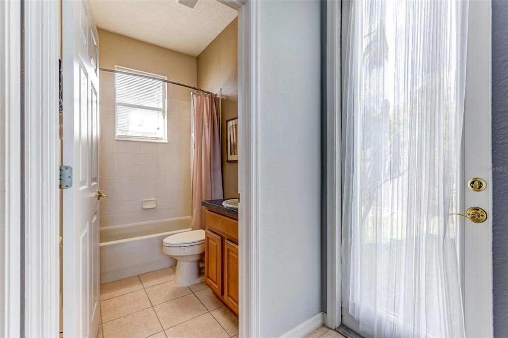 918 Algare Loop Windermere, FL 34786 - Photo 22 of 73 a bathroom with a toilet and a shower