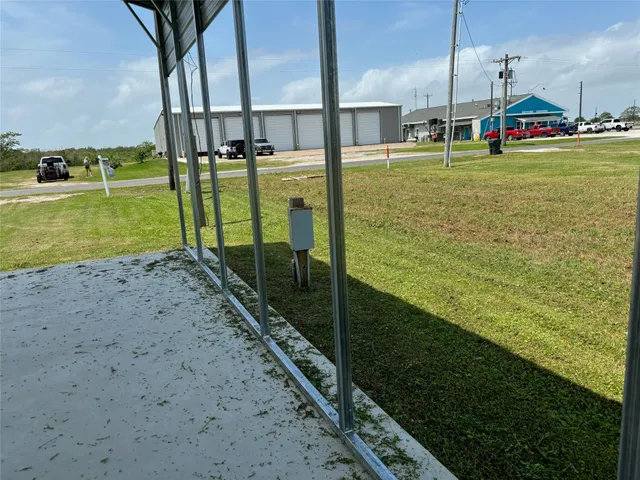 a view of a lake with a big yard