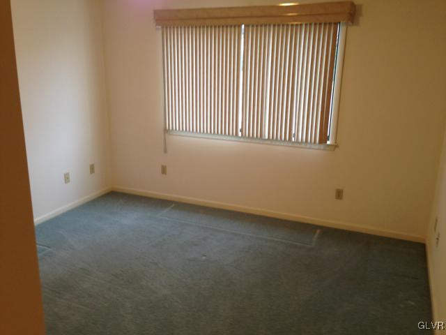853 Cold Spring Road Allentown, PA 18103 - Photo 15 of 27 an empty room with a window