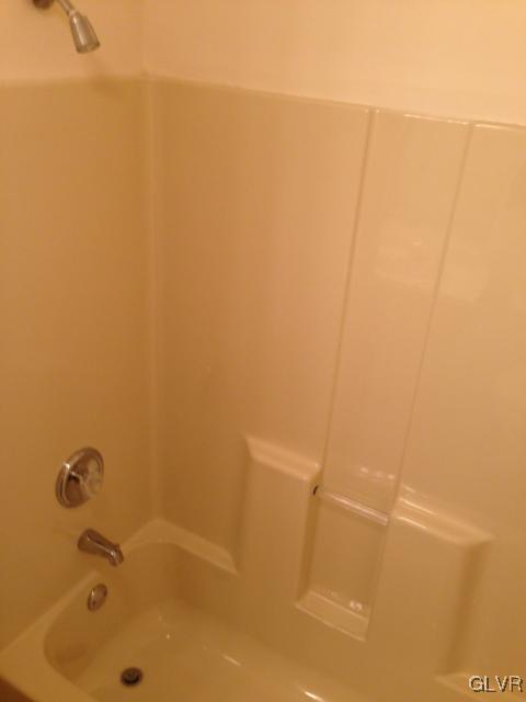 853 Cold Spring Road Allentown, PA 18103 - Photo 22 of 27 a bathroom with a tub