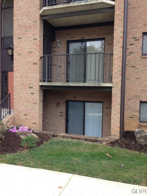 853 Cold Spring Road Allentown, PA 18103 - Photo 3 of 27 a front view of a house with a garden