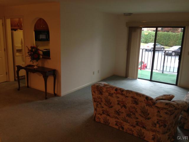 853 Cold Spring Road Allentown, PA 18103 - Photo 5 of 27 a bedroom with a bed and a window