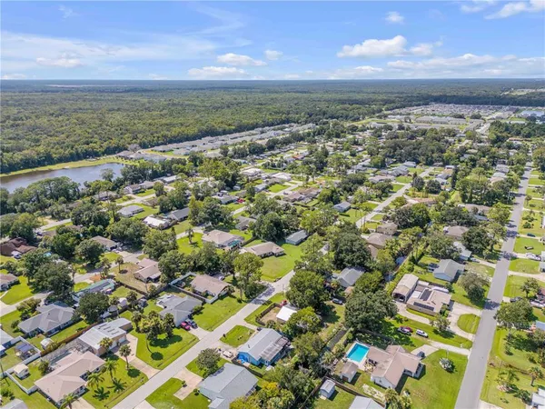an aerial view of residential building and street