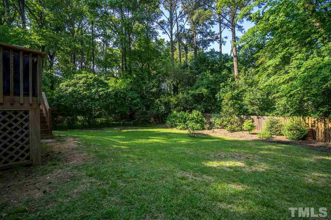 539 Banks Street Raleigh, NC 27604 - Photo 14 of 25 a view of a backyard with large trees