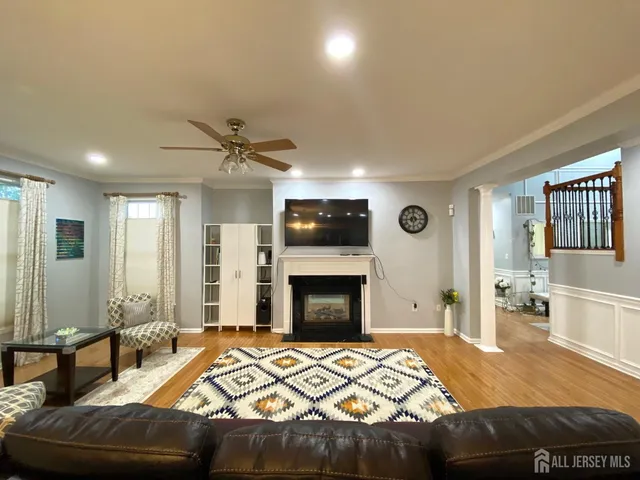 a bedroom with a bed and a fireplace