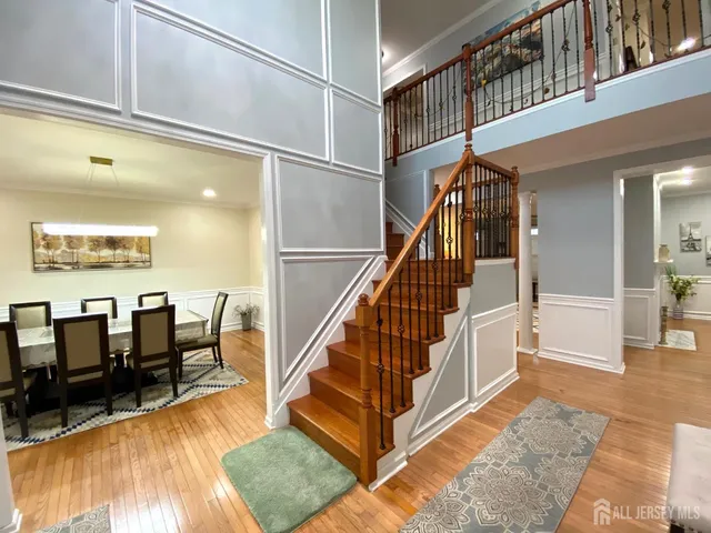 a view of livingroom with furniture and staircase