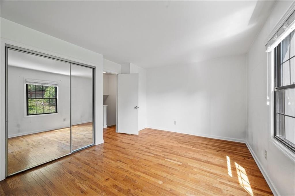 428 Country View Court Pittsburgh, PA 15205 - Photo 16 of 28 a view of empty room with wooden floor and fan