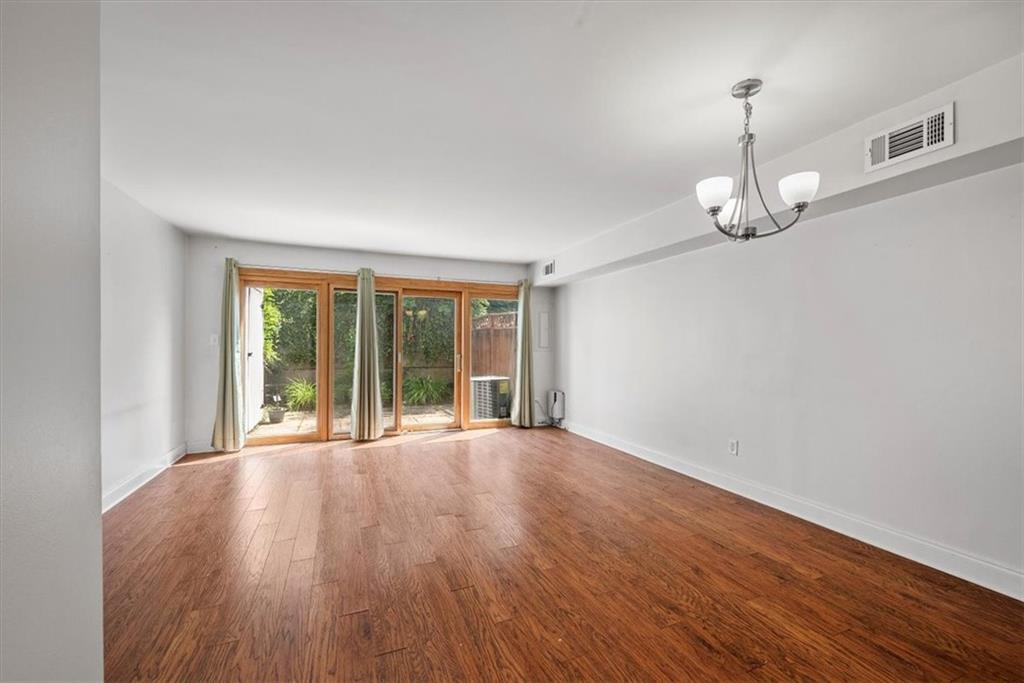 428 Country View Court Pittsburgh, PA 15205 - Photo 5 of 28 wooden floor in an empty room with a window
