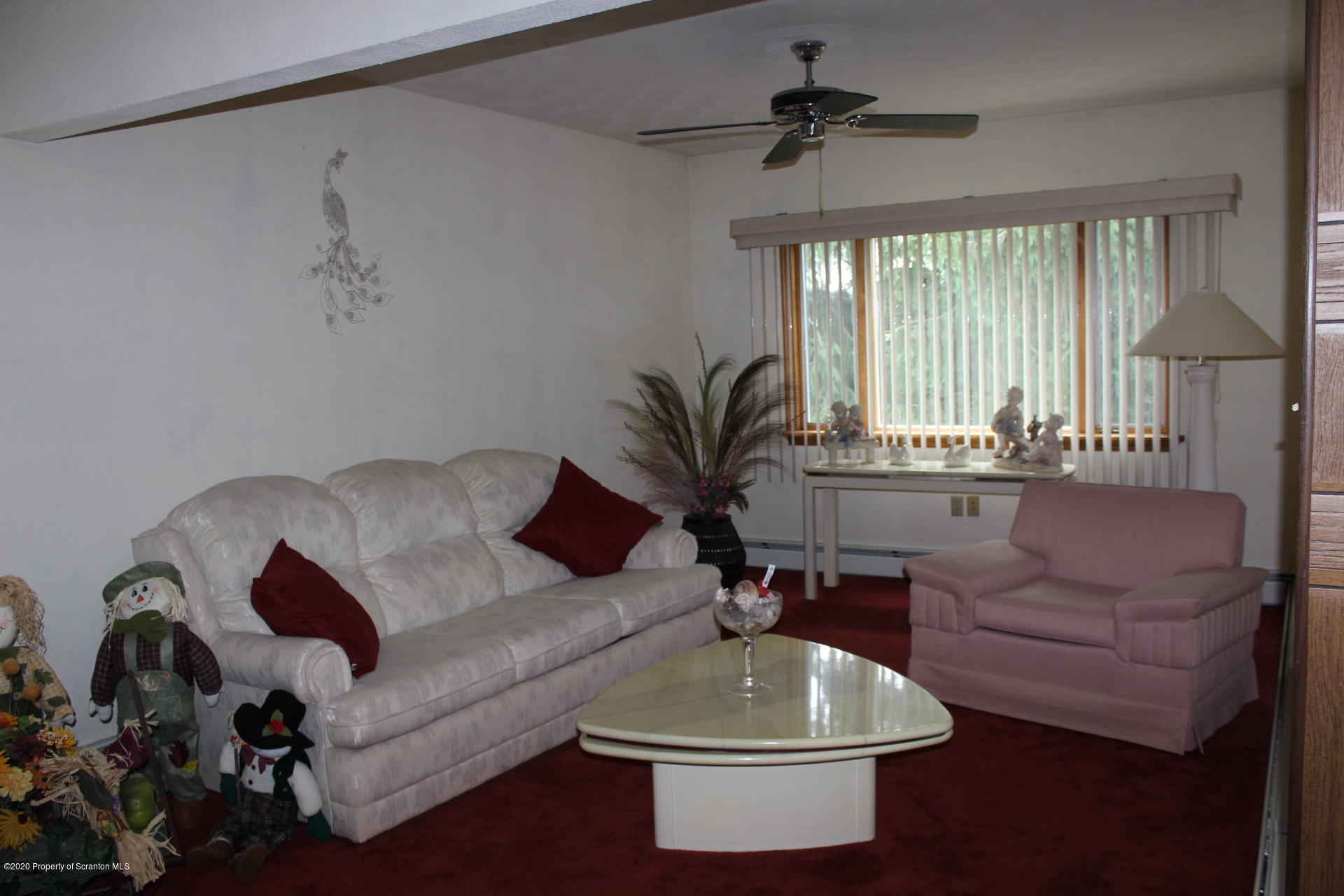 106 Red Shale Road Moscow, PA 18444 - Photo 8 of 26 a living room with furniture and a large window