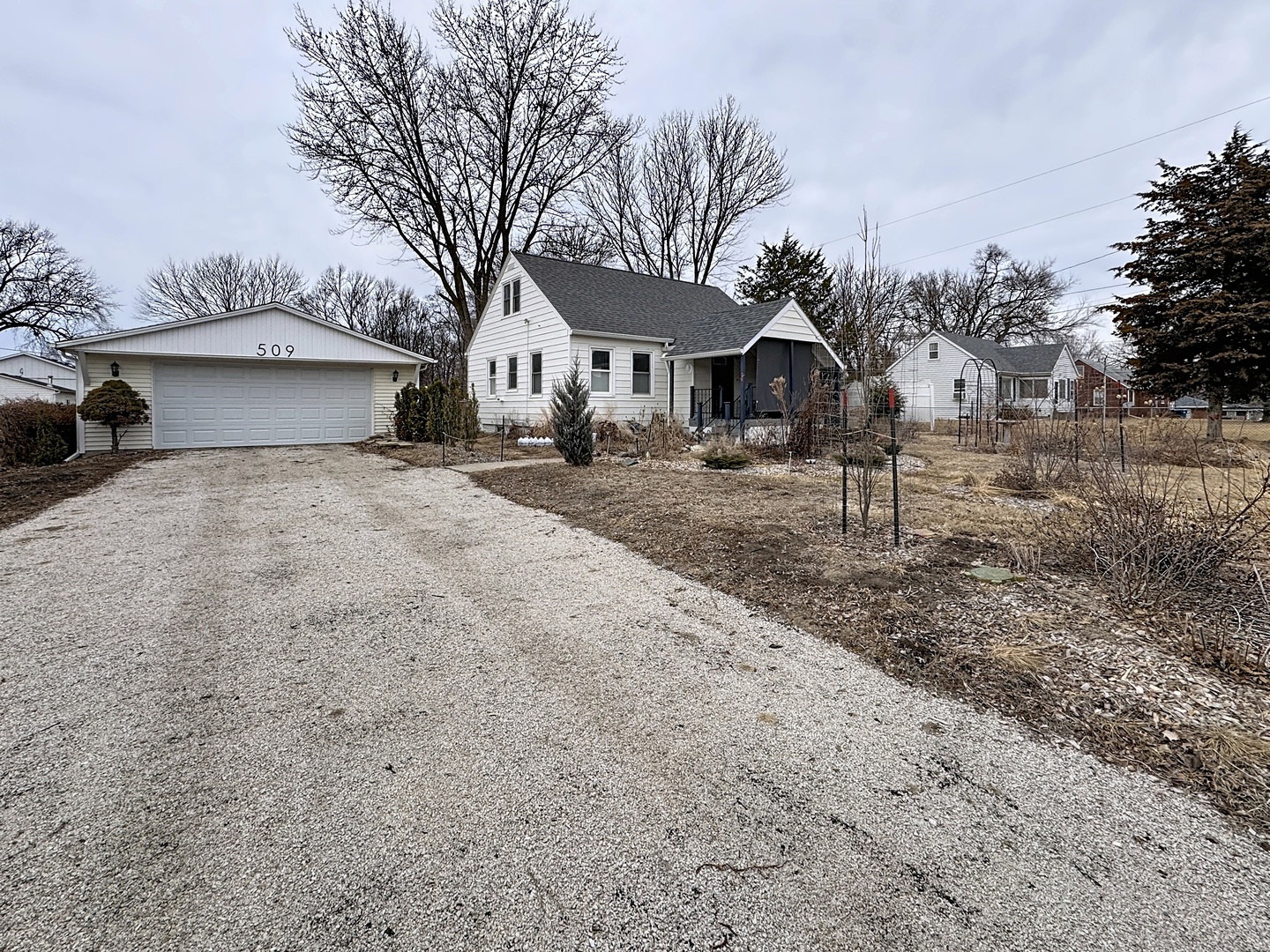 509 40th Street East Moline, IL 61244 - Photo 1 of 23 a front view of a house with a yard