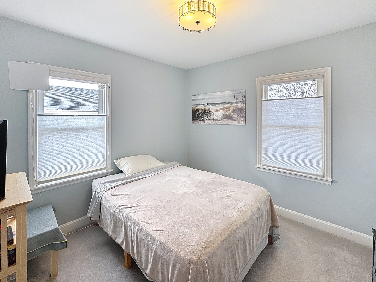 509 40th Street East Moline, IL 61244 - Photo 12 of 23 a bedroom with a bed and a window