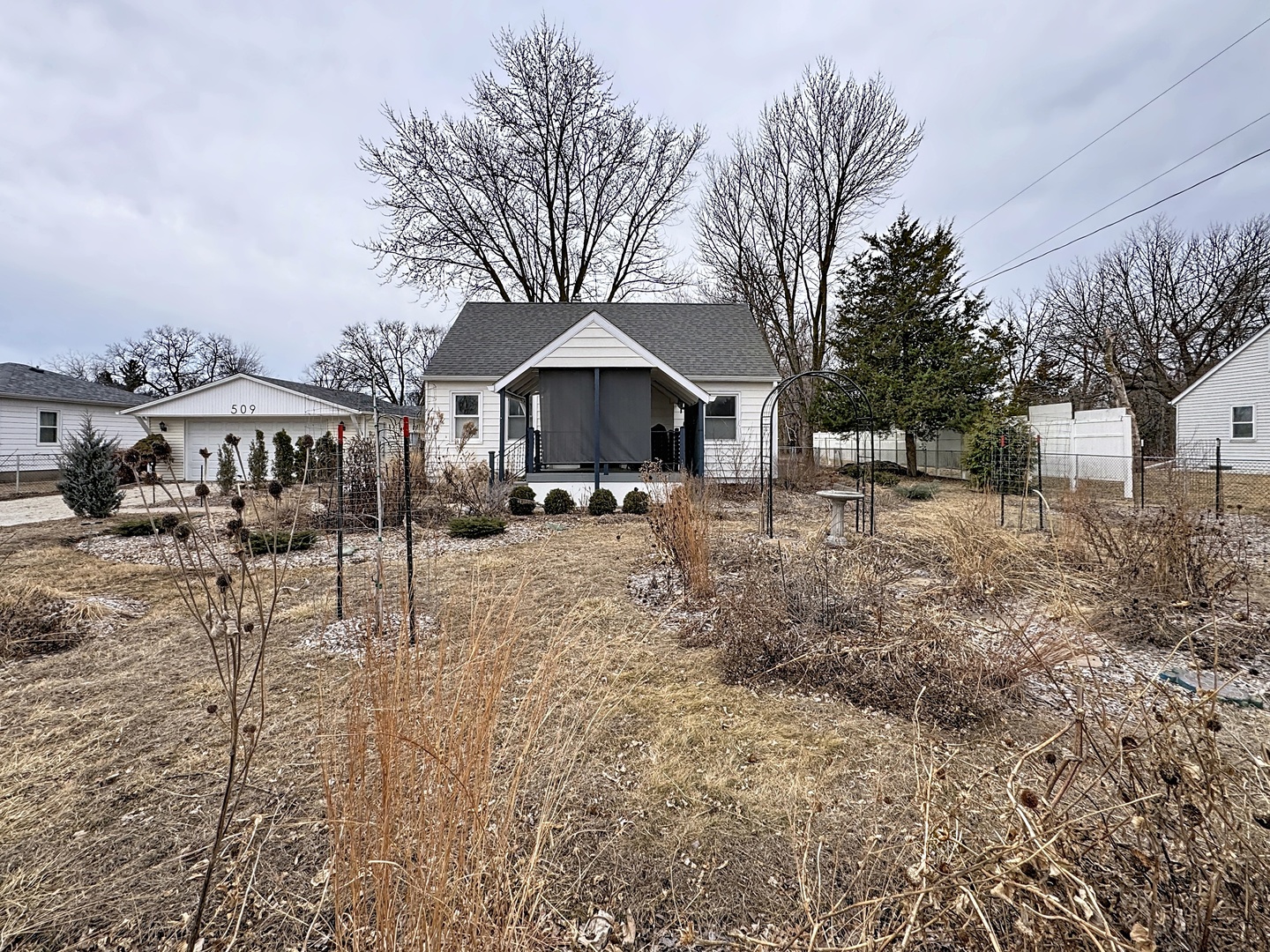 509 40th Street East Moline, IL 61244 - Photo 2 of 23 a front view of a house with a yard