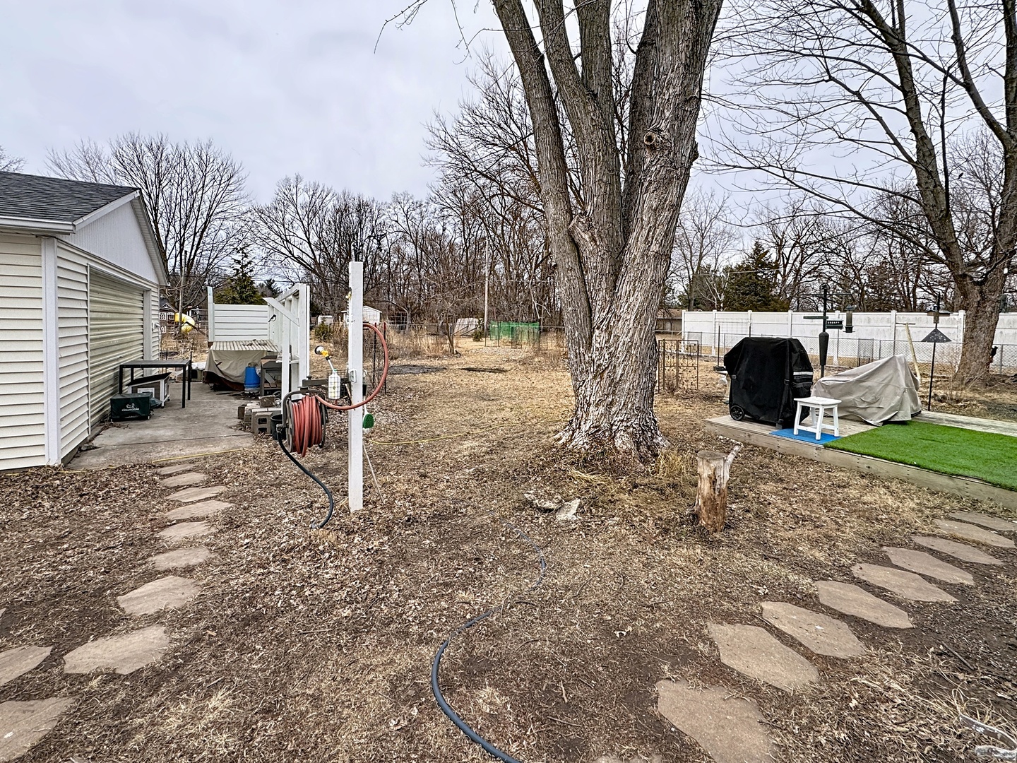 509 40th Street East Moline, IL 61244 - Photo 22 of 23 a view of a yard with a tree
