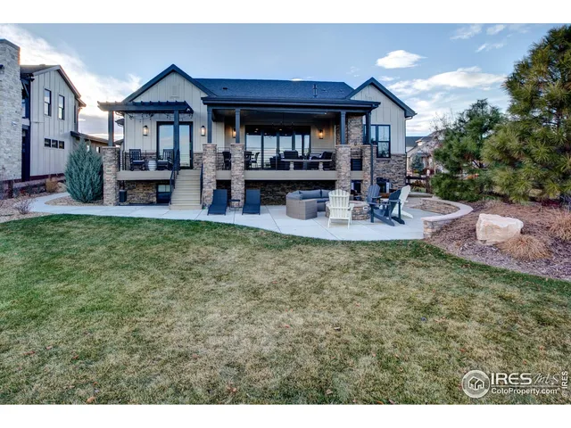 a view of a outdoor space with furniture and garden
