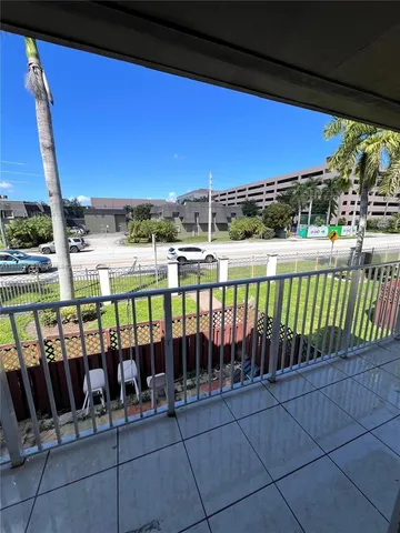 a view of a balcony with city view