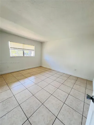 a view of a room and window