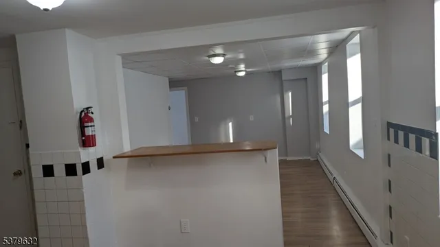 a view of a hallway with entryway