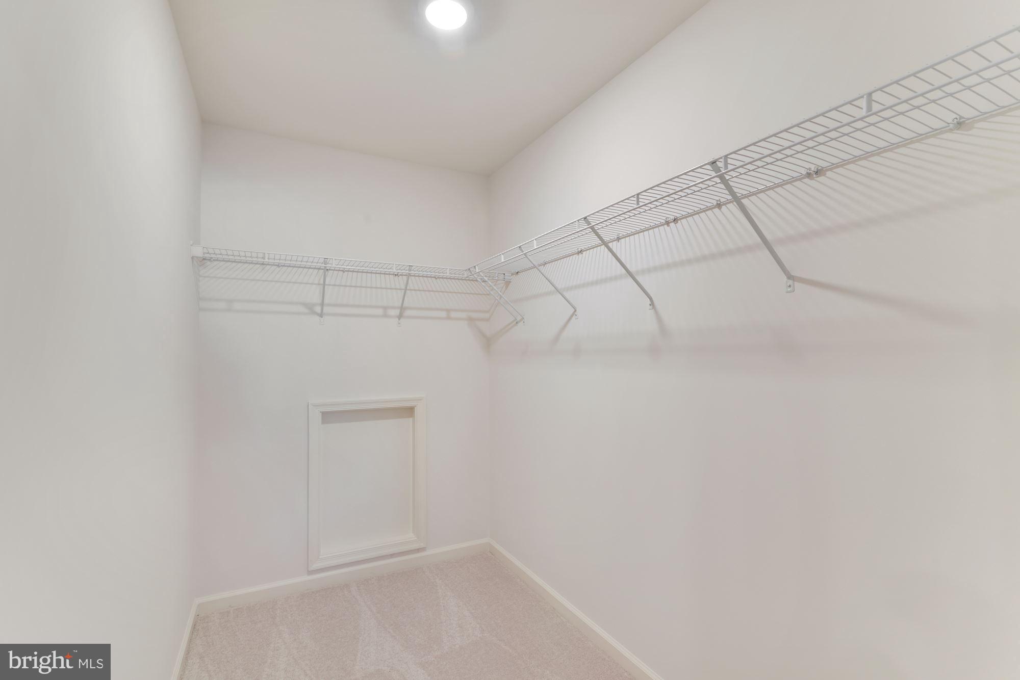 4249 Market Place Perry Hall, MD 21128 - Photo 11 of 17 a view of a room with racks on the wall