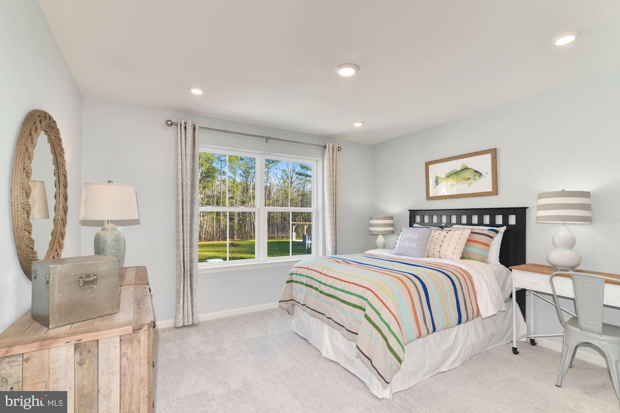 4249 Market Place Perry Hall, MD 21128 - Photo 14 of 17 a bed room with a bed and a large window